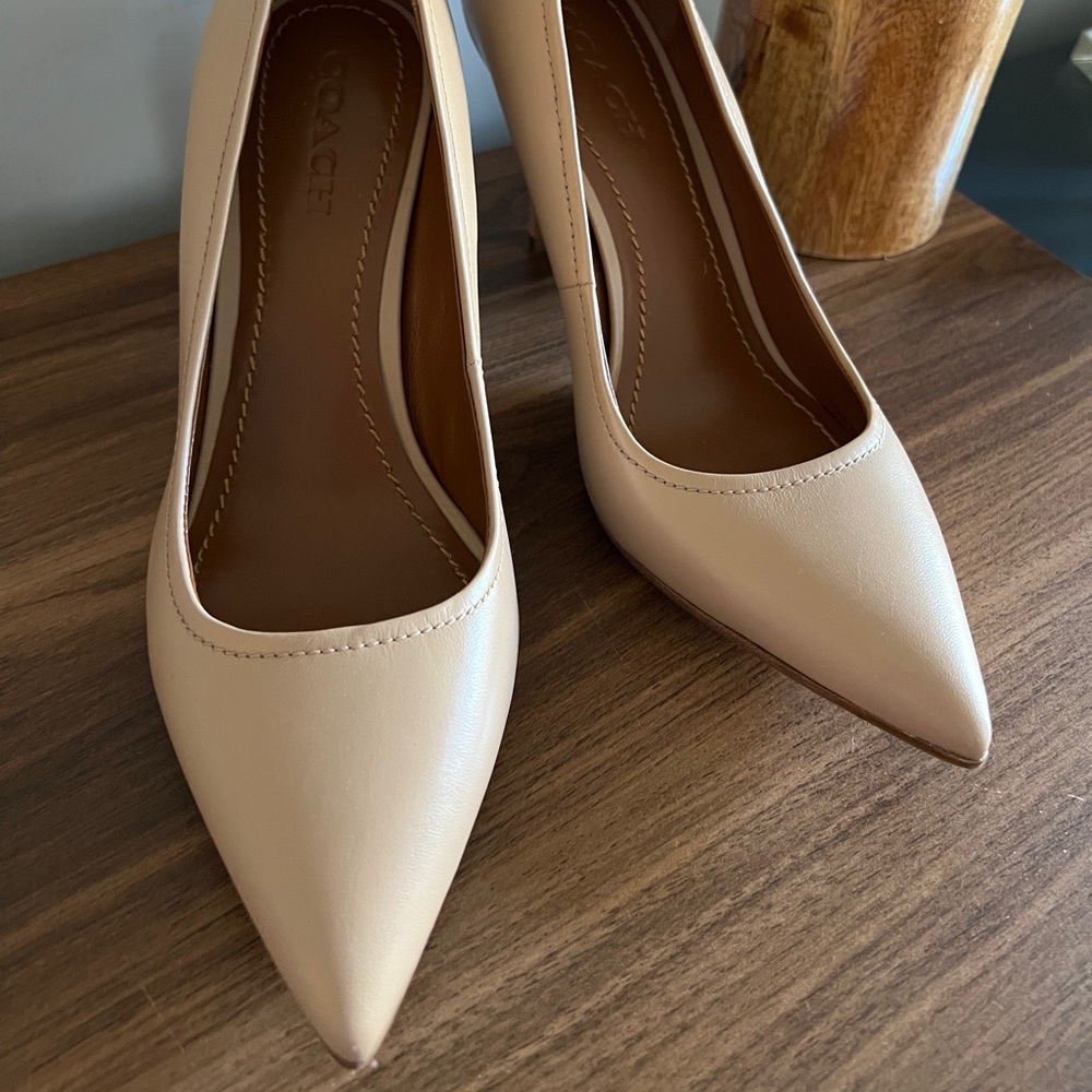Coach leather heels, nude color.